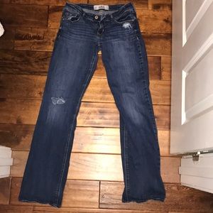 Medium wash holey flare blue jeans